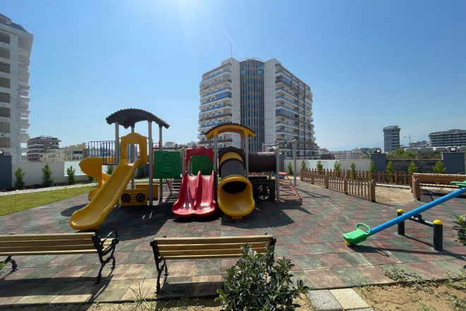 New 1+1 apartment in Mahmutlar with full on-site facilities