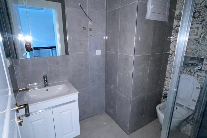 New 1+1 apartment in Mahmutlar with full on-site facilities