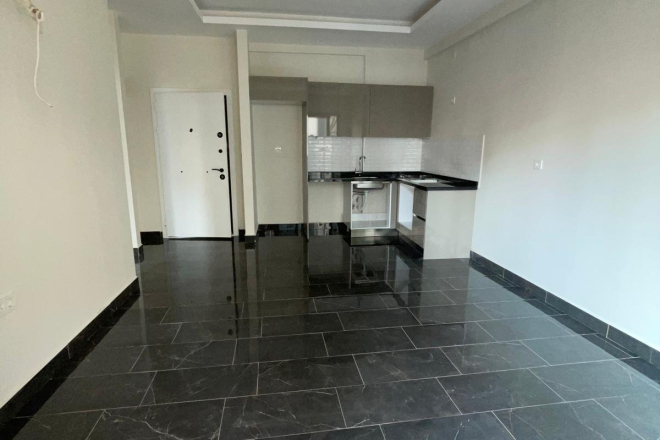 New 1+1 apartment in Mahmutlar with full on-site facilities