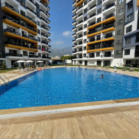 New 1+1 apartment in Mahmutlar with full on-site facilities