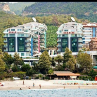 Spacious 3+1 duplex with garden in Kargicak — 100 m to the sea, eligible for citizenship