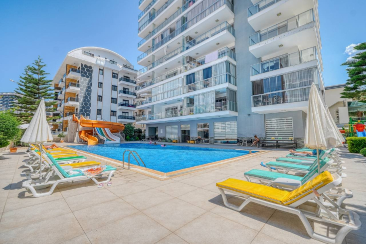 Spacious 1+1 apartment in Mahmutlar near the sea — furnished property in Alanya