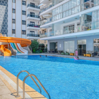 Spacious 1+1 apartment in Mahmutlar near the sea — furnished property in Alanya