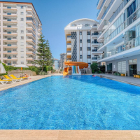 Spacious 1+1 apartment in Mahmutlar near the sea — furnished property in Alanya