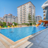 Spacious 1+1 apartment in Mahmutlar near the sea — furnished property in Alanya