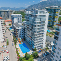 Spacious 1+1 apartment in Mahmutlar near the sea — furnished property in Alanya