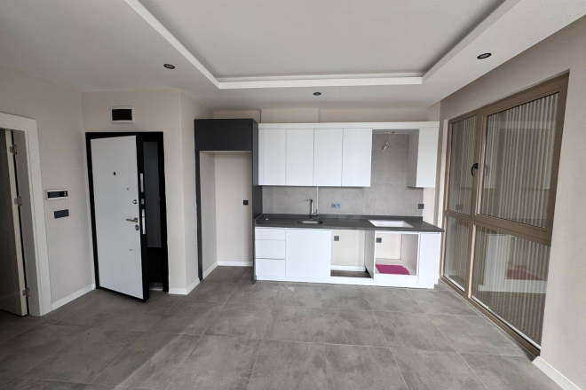 New 1+1 Apartment in Mahmutlar — Property in Alanya Near the Sea for Living or Rental Income