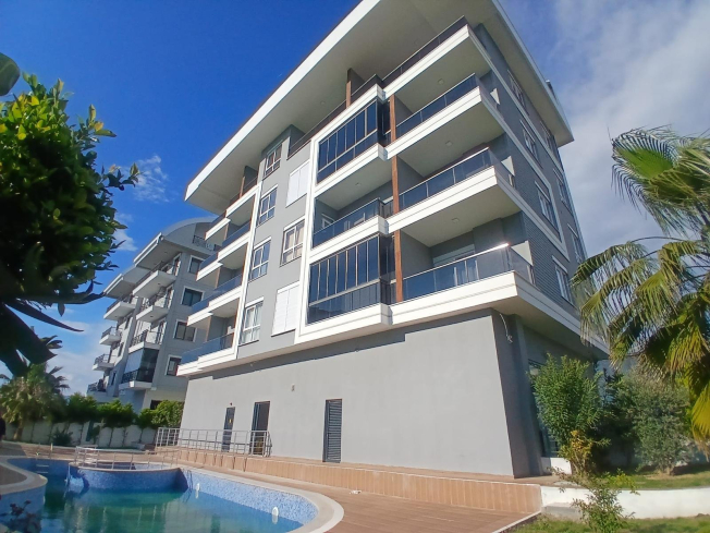 Modern 1+1 apartment in Kargicak — new residence with pool close to the sea