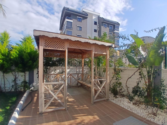 Modern 1+1 apartment in Kargicak — new residence with pool close to the sea