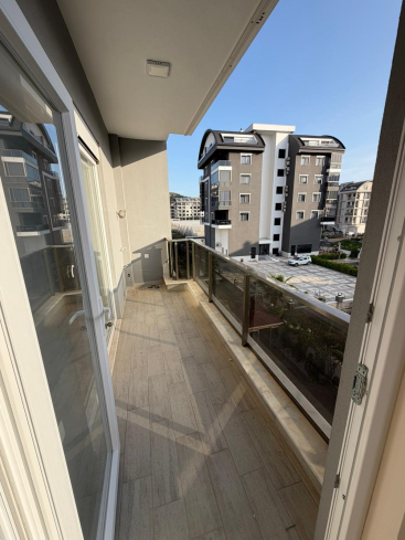 Modern 1+1 apartment in Kargicak — new residence with pool close to the sea