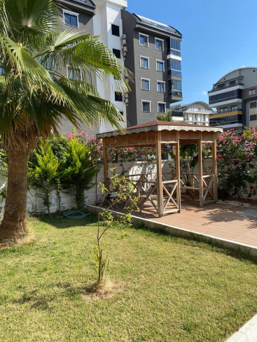 Modern 1+1 apartment in Kargicak — new residence with pool close to the sea