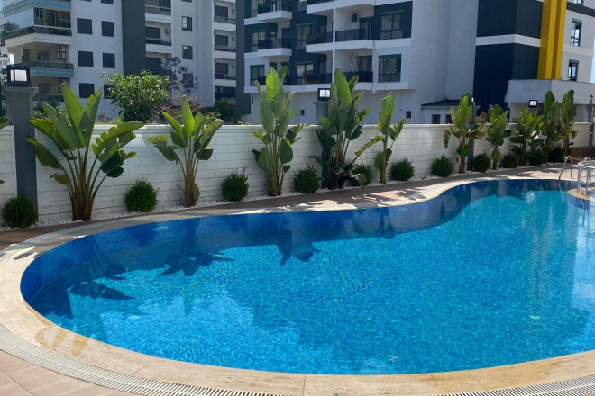 Modern 1+1 apartment in Kargicak — new residence with pool close to the sea