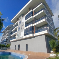 Modern 1+1 apartment in Kargicak — new residence with pool close to the sea