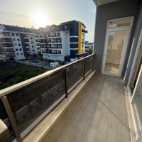 Modern 1+1 apartment in Kargicak — new residence with pool close to the sea