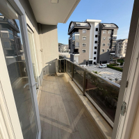 Modern 1+1 apartment in Kargicak — new residence with pool close to the sea