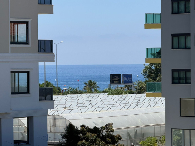 1+1 Apartment in Kargicak Near the Sea — Furnished Property in a Modern Residence