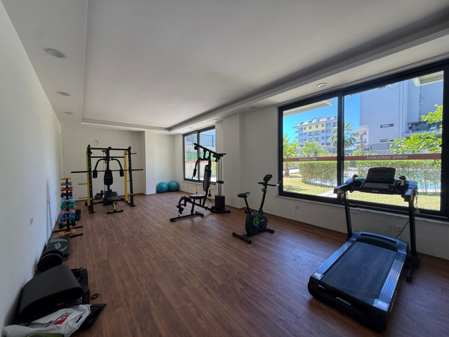 1+1 Apartment in Kargicak Near the Sea — Furnished Property in a Modern Residence
