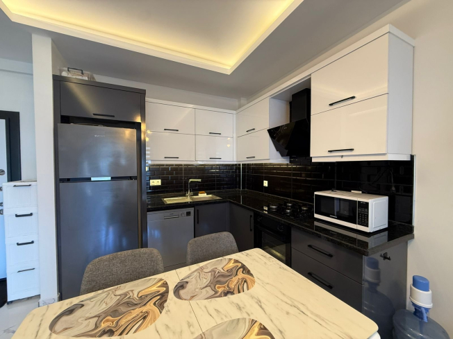 1+1 Apartment in Kargicak Near the Sea — Furnished Property in a Modern Residence