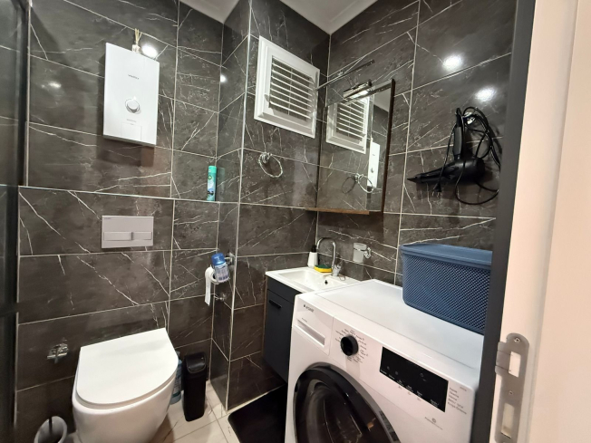 1+1 Apartment in Kargicak Near the Sea — Furnished Property in a Modern Residence