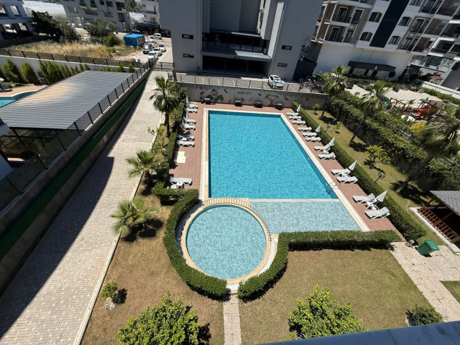 1+1 Apartment in Kargicak Near the Sea — Furnished Property in a Modern Residence