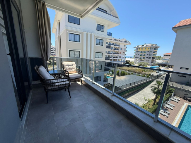 1+1 Apartment in Kargicak Near the Sea — Furnished Property in a Modern Residence