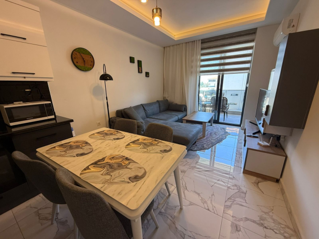 1+1 Apartment in Kargicak Near the Sea — Furnished Property in a Modern Residence