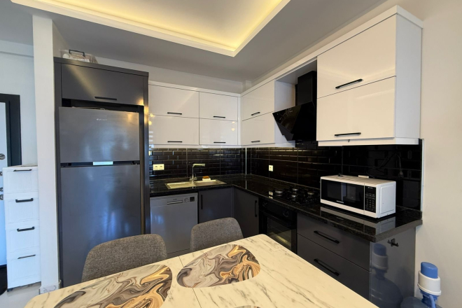 1+1 Apartment in Kargicak Near the Sea — Furnished Property in a Modern Residence