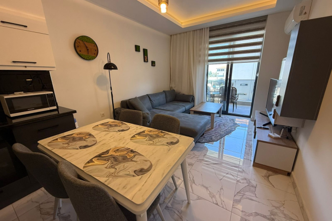 1+1 Apartment in Kargicak Near the Sea — Furnished Property in a Modern Residence