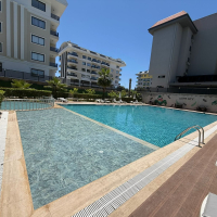 1+1 Apartment in Kargicak Near the Sea — Furnished Property in a Modern Residence