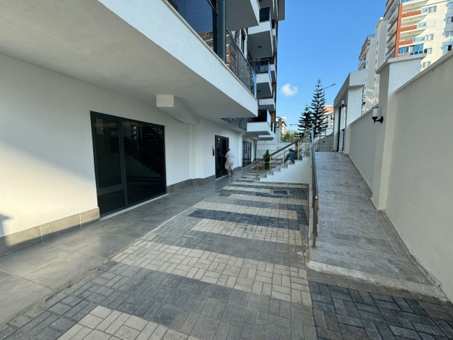 1+1 Apartment in Mahmutlar — New 2026 Building, 600 m from the Sea, €63,000