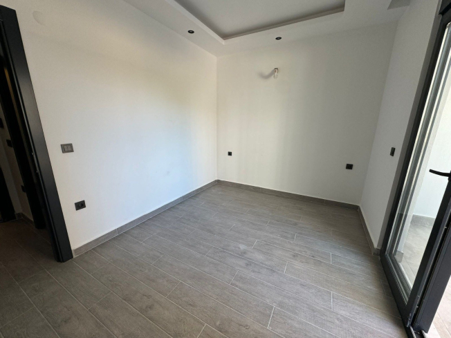 1+1 Apartment in Mahmutlar — New 2026 Building, 600 m from the Sea, €63,000