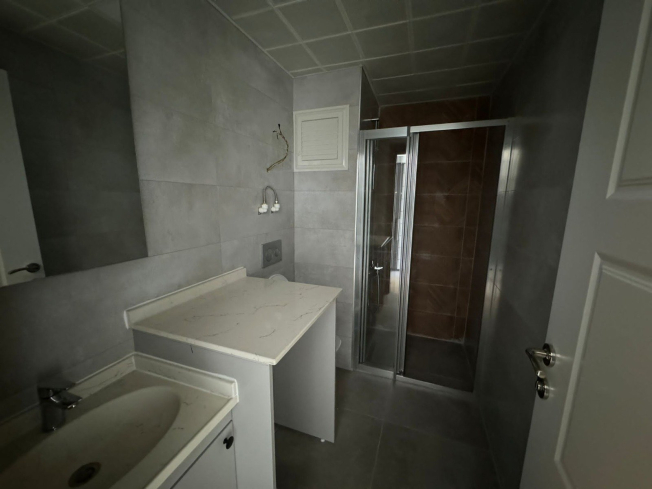 1+1 Apartment in Mahmutlar — New 2026 Building, 600 m from the Sea, €63,000