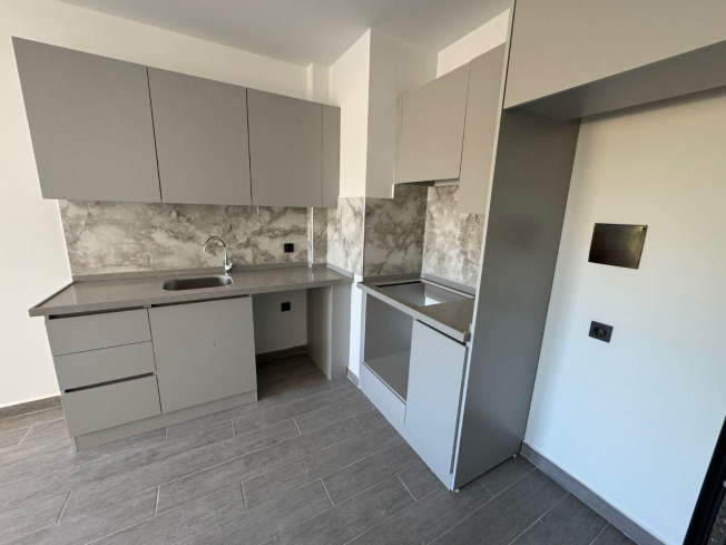 1+1 Apartment in Mahmutlar — New 2026 Building, 600 m from the Sea, €63,000