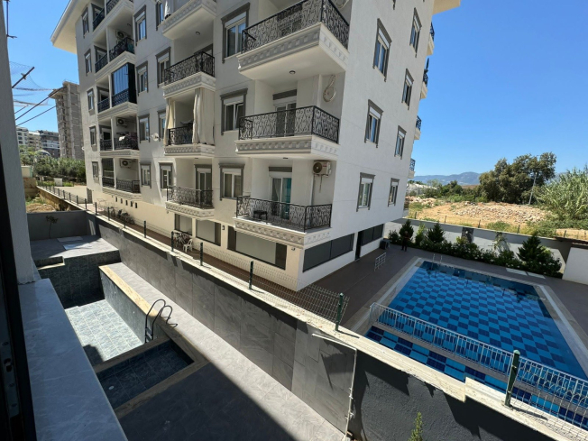 1+1 Apartment in Mahmutlar — New 2026 Building, 600 m from the Sea, €63,000