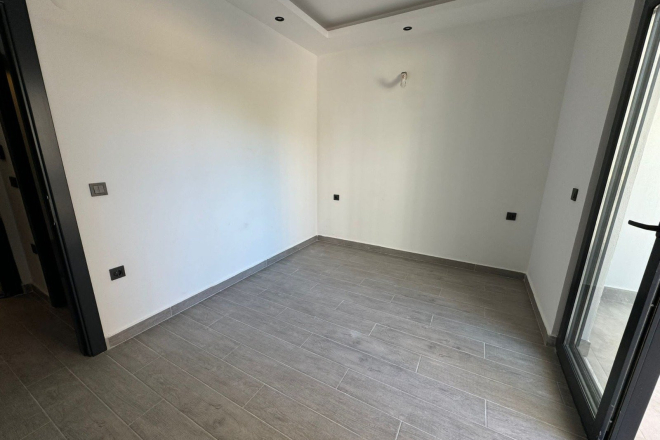 1+1 Apartment in Mahmutlar — New 2026 Building, 600 m from the Sea, €63,000