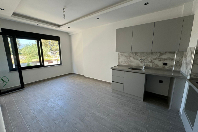 1+1 Apartment in Mahmutlar — New 2026 Building, 600 m from the Sea, €63,000