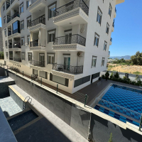 1+1 Apartment in Mahmutlar — New 2026 Building, 600 m from the Sea, €63,000