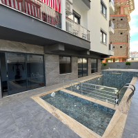 1+1 Apartment in Mahmutlar — New 2026 Building, 600 m from the Sea, €63,000