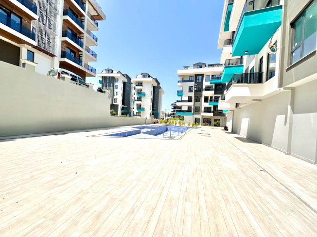 1+1 Apartment in Cleopatra, Alanya — New Residence with Pool, Furniture and Rental Potential