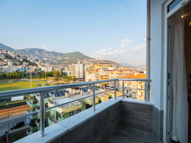 1+1 Apartment in Cleopatra, Alanya — Furnished Property with Pool, Sea View and Residence Permit Potential