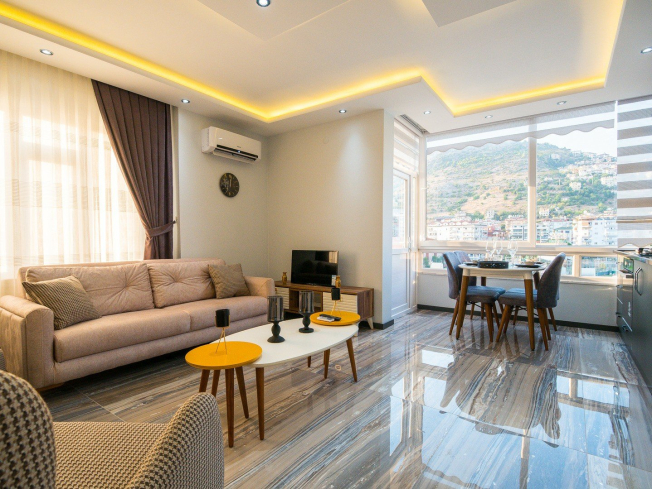 1+1 Apartment in Cleopatra, Alanya — Furnished Property with Pool, Sea View and Residence Permit Potential