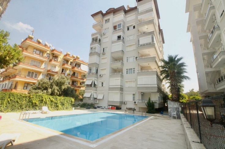 1+1 Apartment in Cleopatra, Alanya — Furnished Property with Pool, Sea View and Residence Permit Potential