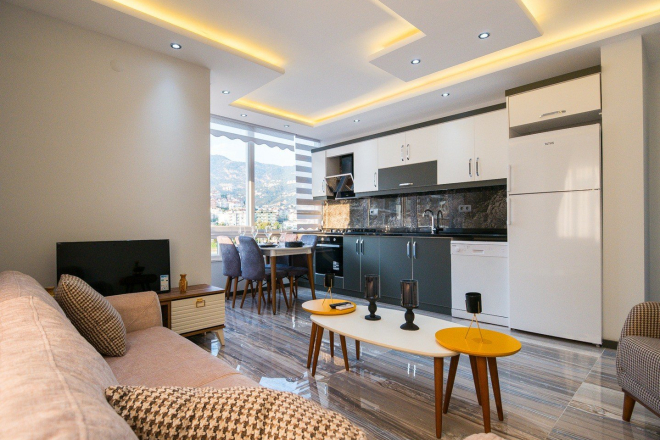 1+1 Apartment in Cleopatra, Alanya — Furnished Property with Pool, Sea View and Residence Permit Potential