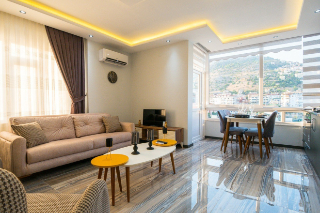 1+1 Apartment in Cleopatra, Alanya — Furnished Property with Pool, Sea View and Residence Permit Potential