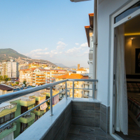 1+1 Apartment in Cleopatra, Alanya — Furnished Property with Pool, Sea View and Residence Permit Potential