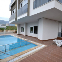 1+1 Apartment in Mahmutlar — Furnished Property with Pool, Sauna and 400 m to the Sea