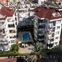 2+1 Apartment in Alanya Center — 300 m to the Sea, Furnished, Pool and Residence Permit Potential