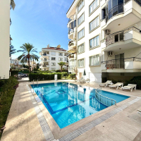 2+1 Apartment in Alanya Center — 300 m to the Sea, Furnished, Pool and Residence Permit Potential
