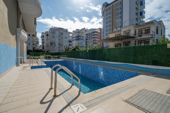 Affordable 1+1 Apartment in Mahmutlar — Furnished, Pool and 500 m from the Sea