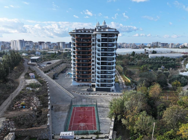 1+1 Apartment in Mahmutlar — New 2023 Residence, Furnished, Pools and €65,000 Price